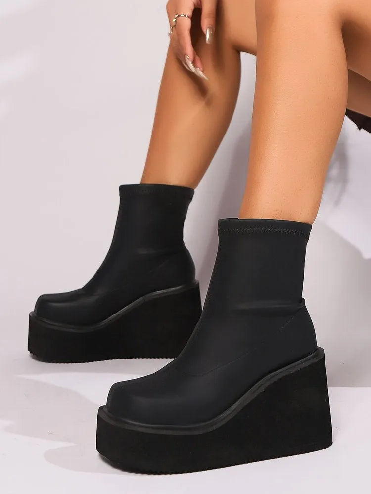 Plus size women's black wedge heel ankle boots with round toe and waterproof platform