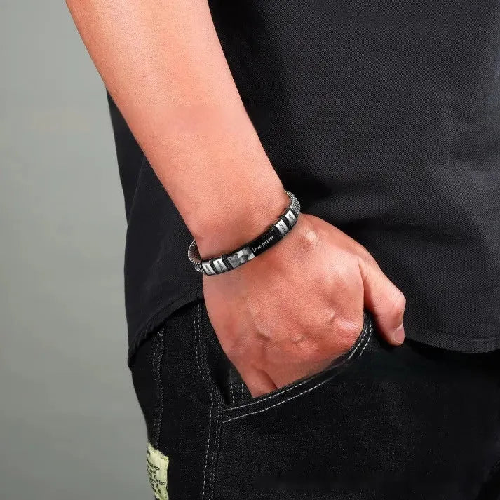 Titanium steel men's bracelet with heart-shaped lettering beads and braided leather rope sections.