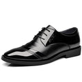 Men's casual Korean pointed PU leather shoes with stitching detail and rubber sole