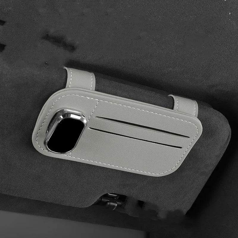 Cowhide leather automotive sun visor holder with glasses clip and card slots in beige colour.