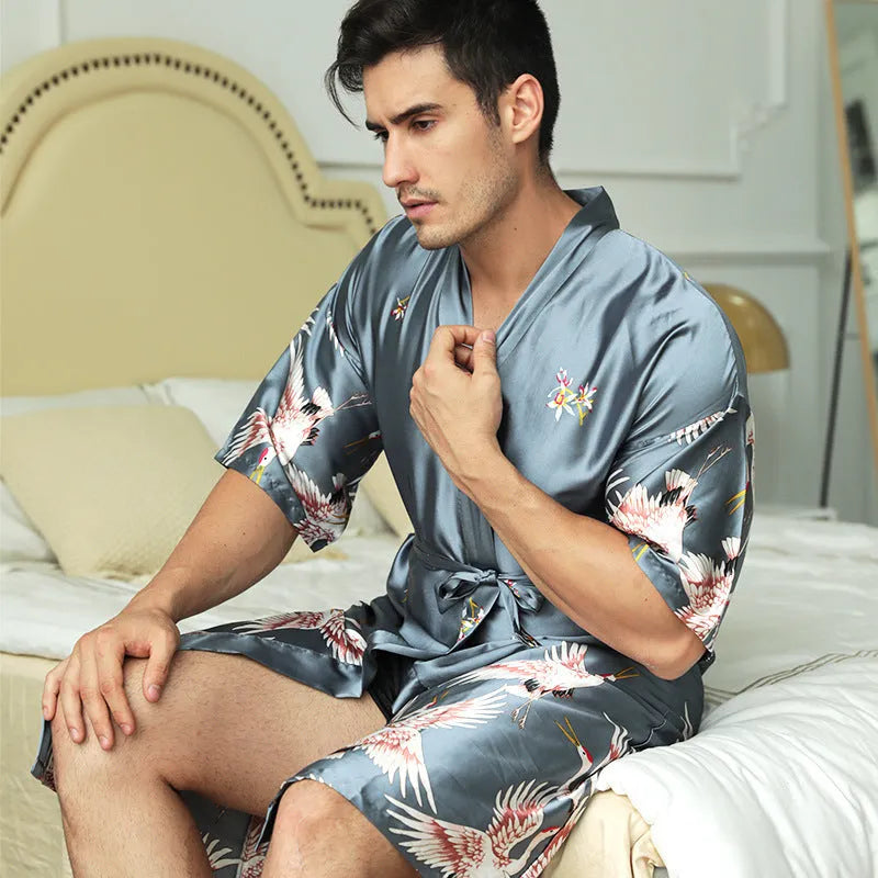 Mid-length printed artificial silk men's nightgown in cardigan style, black colour, on a hanger