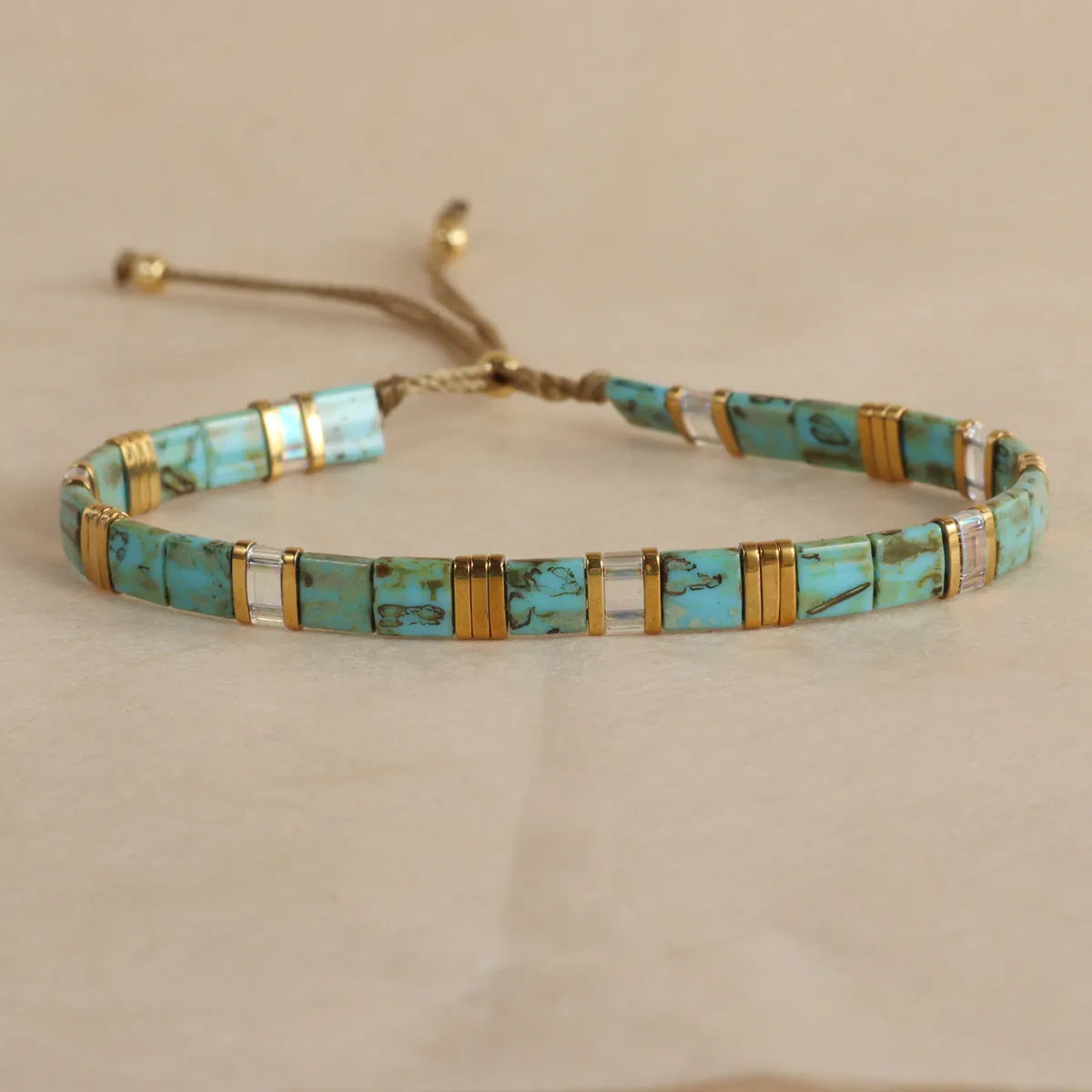 Geometric glass and coloured glaze beaded bracelet with round elements in five colour options