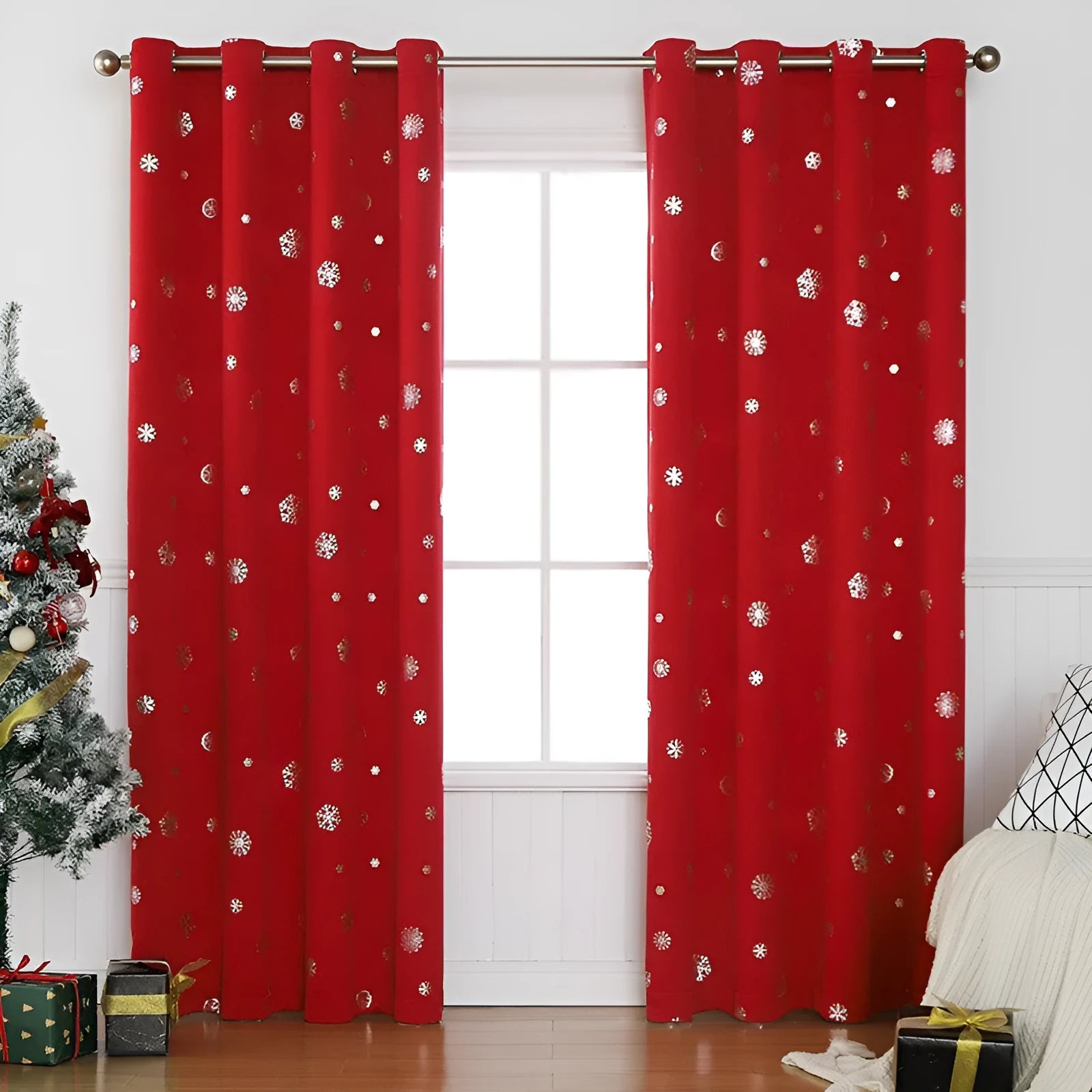 Red snowflake pattern shade cloth curtain with iron hoop hanging tabs.