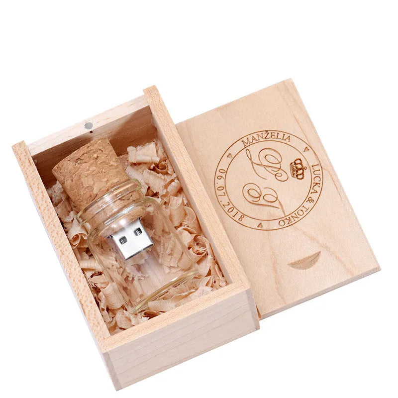 Chocolate brown wooden USB drive in a drift bottle storage disk shape with custom lettering on the side.