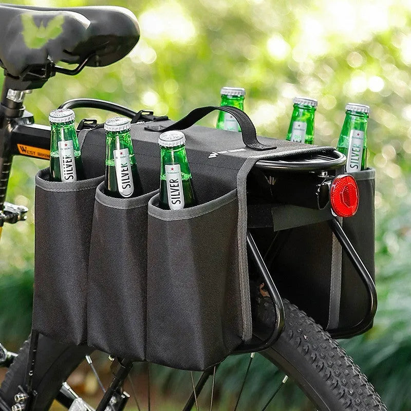 Black bicycle drink bottle cage storage bag mounted on bike frame showing 600D PVC construction and 2-litre capacity