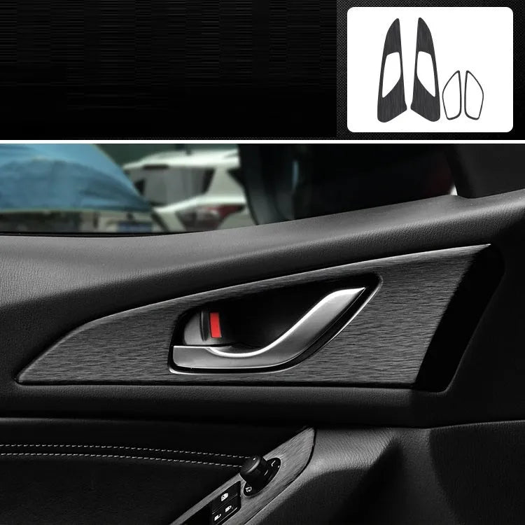 Car interior decorative film sticker kit showing carbon fibre pattern applied to centre console and dashboard