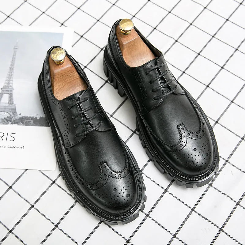 Men's black brogue leather shoes with round toe and traditional brogue detailing