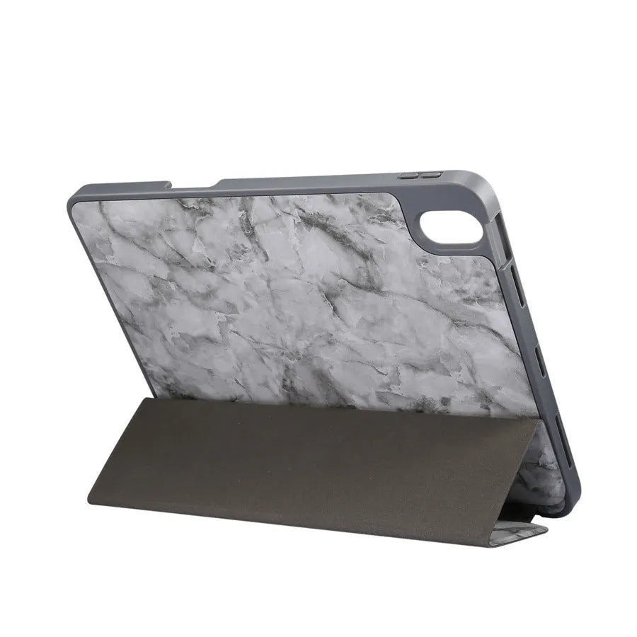 Tri-fold imitation leather iPad case in dark grey, shown open with a stylus in the integrated pen slot.