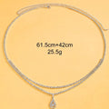 Gold waist chain with rhinestone water drop pendant and adjustable lobster clasp