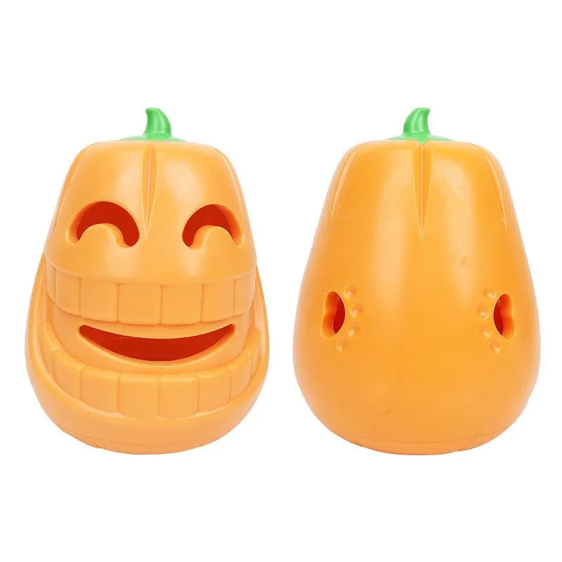 Orange Halloween pumpkin shaped durable rubber dog toy with a treat-dispensing funnel opening.