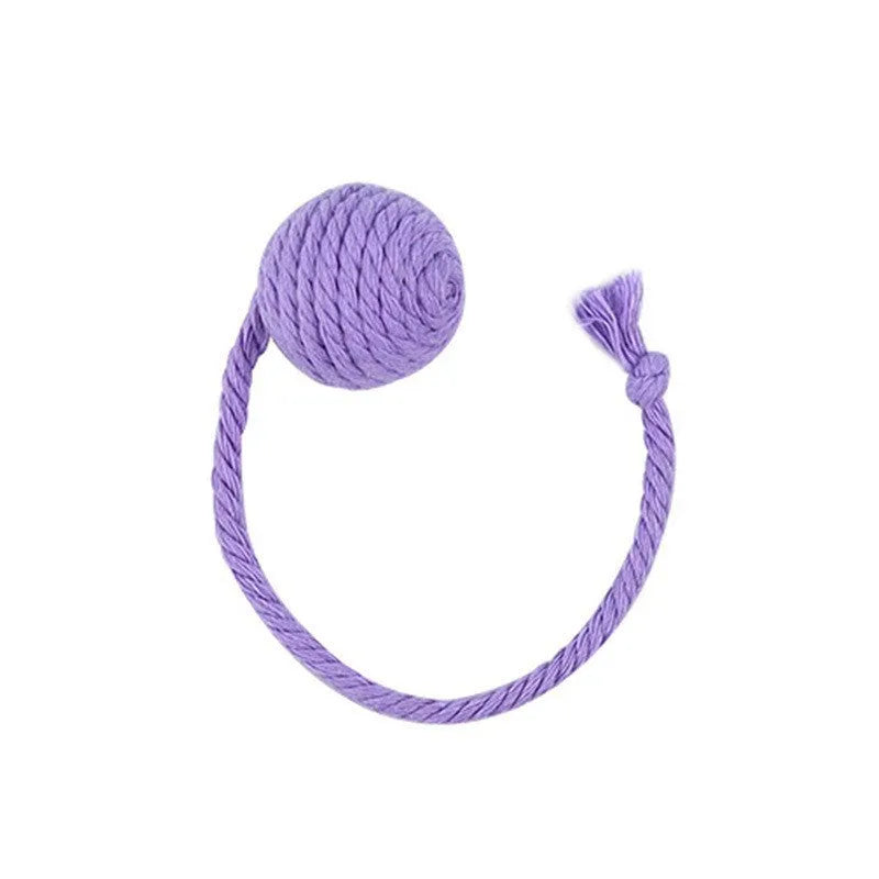 Cat toy ball with attached rope and bell in green, pink, purple or yellow colours showing 6cm and 3cm size comparison