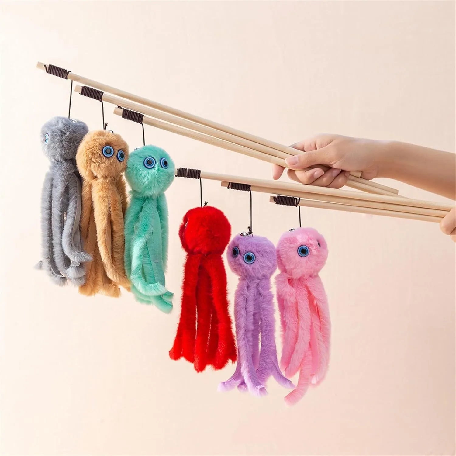 Grey octopus cat toy with eyes on long stick for indoor kitten play