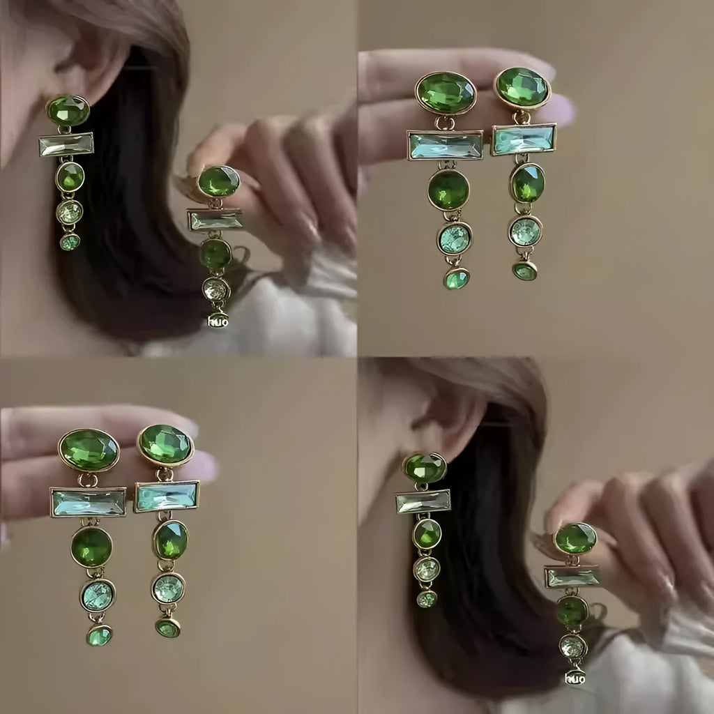 A pair of green gradient tassel earrings with geometric alloy settings and inlaid zircon stones.