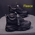 Women's black casual platform shoes with mesh upper and hollow-out design featuring toe holder