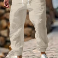 Men's elastic waist linen trousers in straight fit available in seven colours including Army Green and dark brown