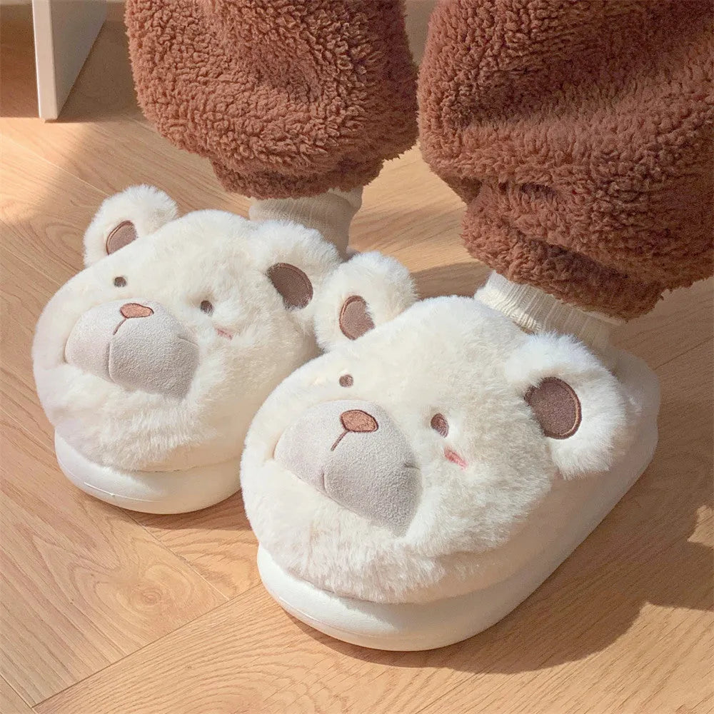 Women's plush slippers with suede upper, fleece lining and cartoon pattern in round toe design
