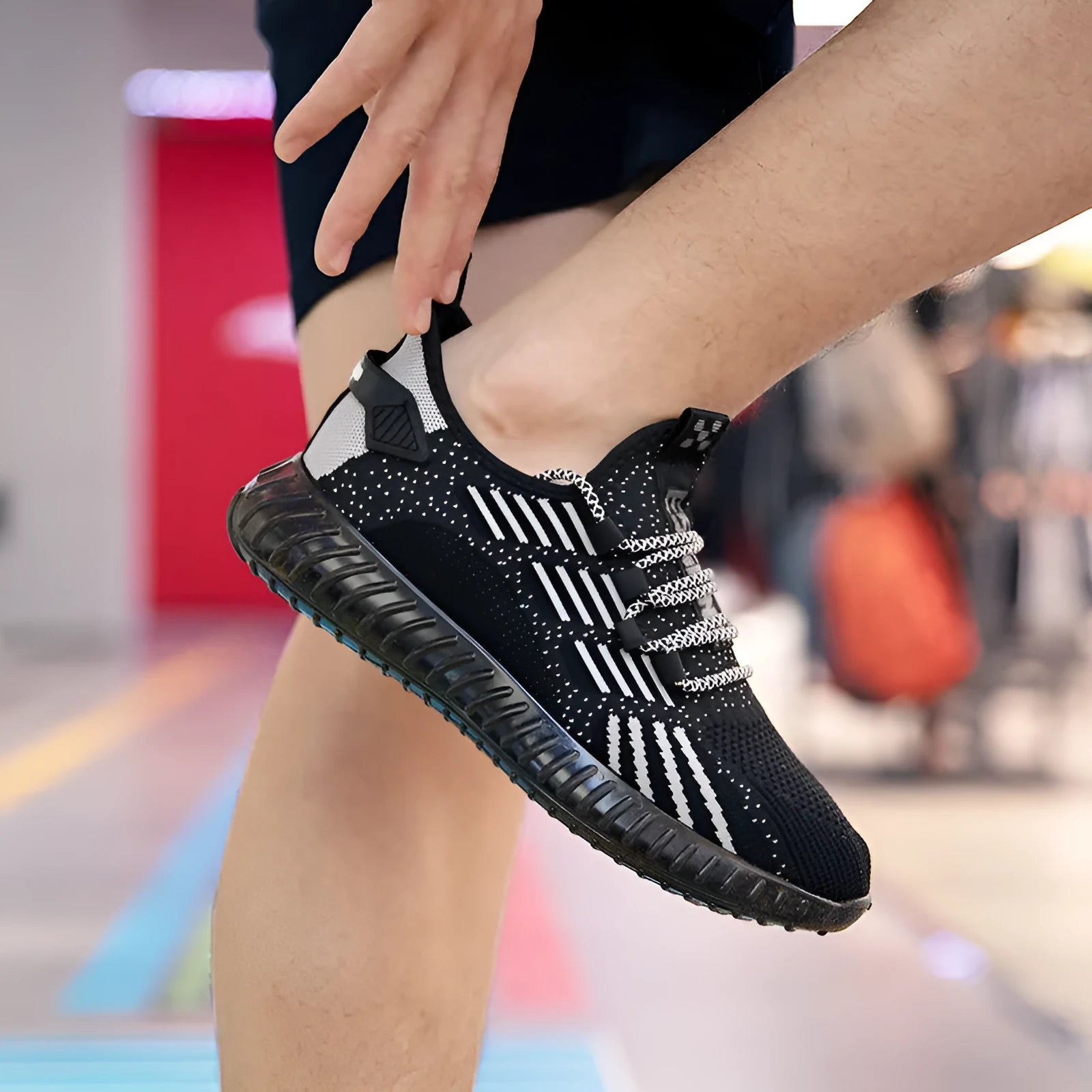Men's white breathable flying fabric sports shoes with mesh lining and a low-platform sole.