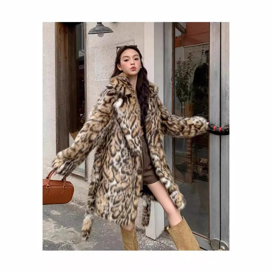 A long faux fur street fashion coat with a fur collar and pockets, shown in an urban setting.