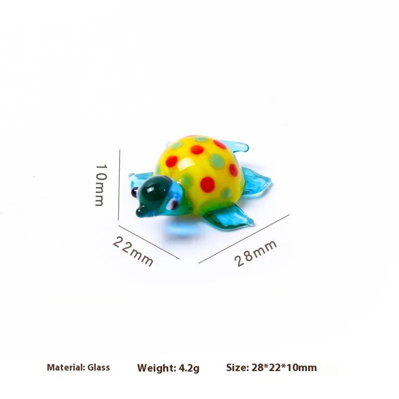 Glass turtle ornament with geometric modern design in six colour variations for desktop decoration