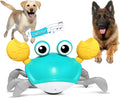 Blue or red electronic crab dog toy with lights, shown moving sideways on a floor.