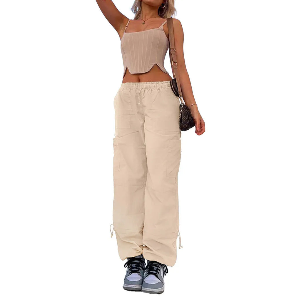 Straight leg multi-pocket cargo trousers in polyester fabric, shown in a neutral colour with visible cargo pockets.