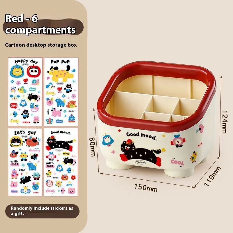 Red and brown cartoon sticker designs on a plastic desktop storage box with grid organiser compartments.
