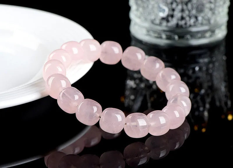 Pink crystal barrel bead bracelet with 11x12mm geometry beads and grinding finish