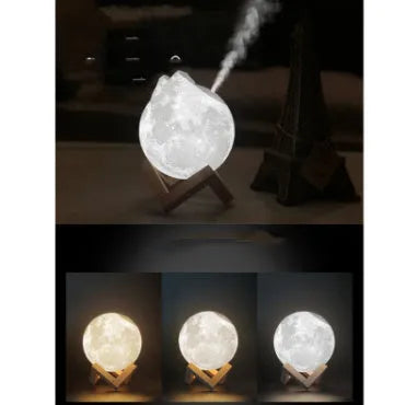Spherical moon humidifier with LED night light on a bedside table, showing USB charging cable