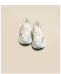 Women's gray and pink retro sneakers with mesh lining, rubber sole, and low-top design