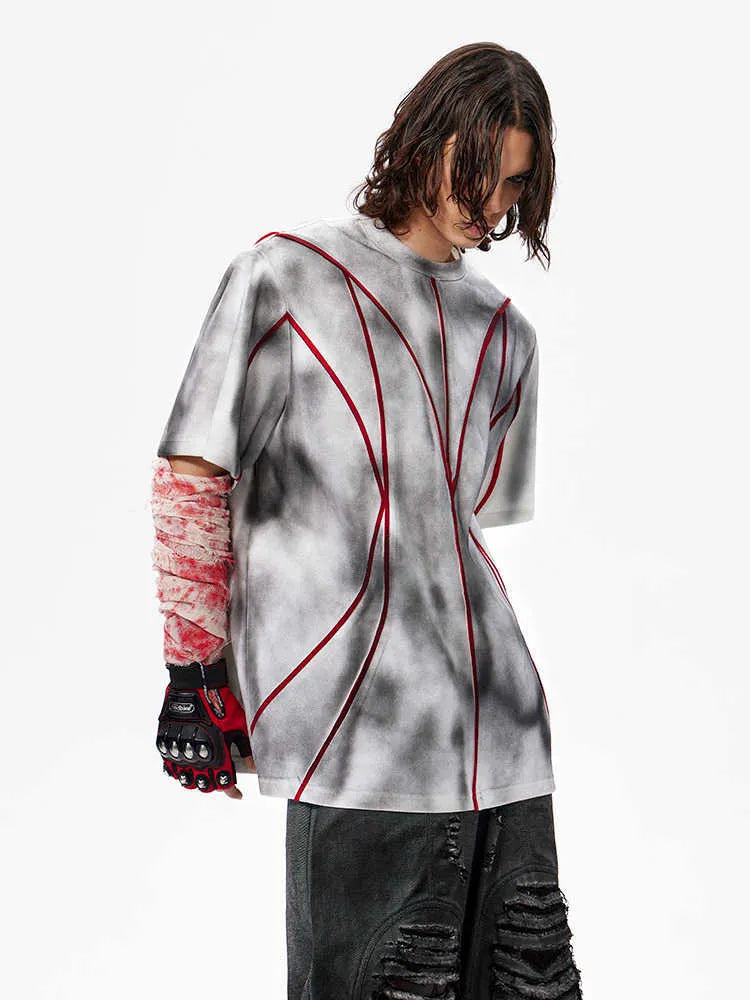 Padded shoulder short sleeve T-shirt with textured line patchwork detailing on round neck