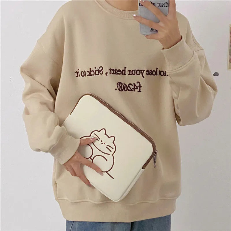 Embroidered cat design tablet protective sleeve in nylon with zipper closure