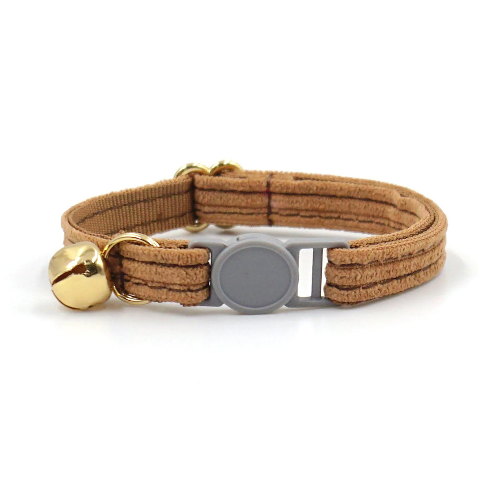 Cloth safety buckle cat collar with bell in brown corduroy on a cat