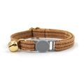 Cloth safety buckle cat collar with bell in brown corduroy on a cat