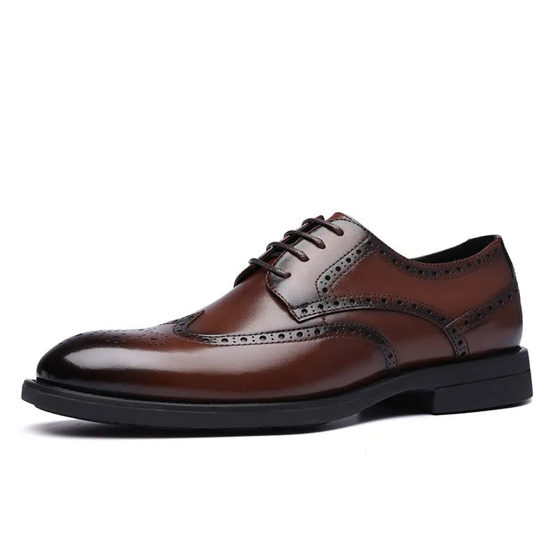 Men's black and brown brogue leather shoes with decorative perforations, shown on a white background.