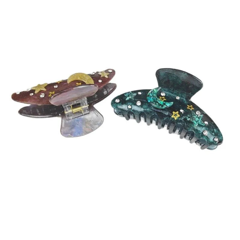 Women's oversized barrette with starry sky pattern in cellulose acetate sheet material