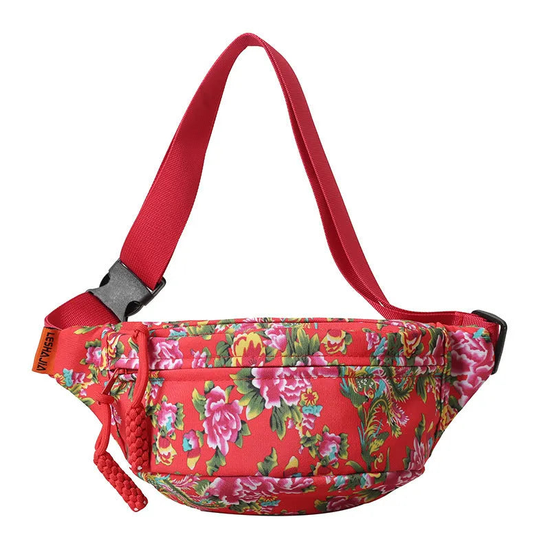 Western-style women's waist bag with large flower design and three-dimensional pockets.