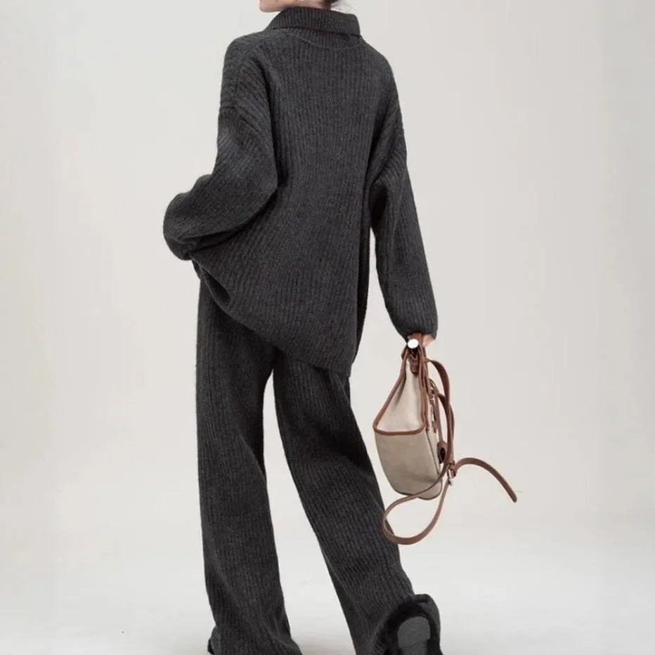 Beige imitation cashmere sweater suit two-piece set with knit top and trousers on a hanger