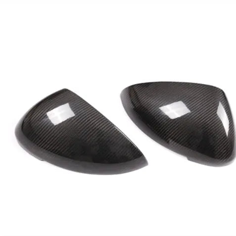 Pair of black true carbon fibre rearview mirror covers for a Porsche Macan.