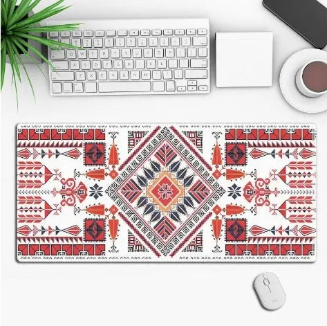 Large custom anime print gaming mouse pad on a desk with keyboard and mouse.