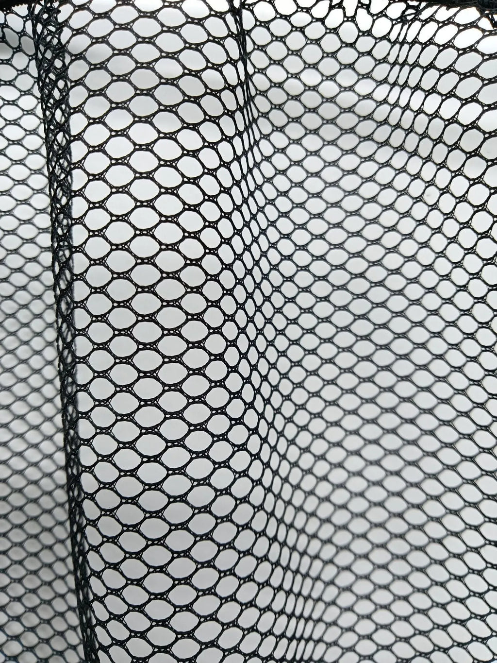 Polyester elastic storage net for car boot organisation in 20x35cm and 20x45cm sizes.