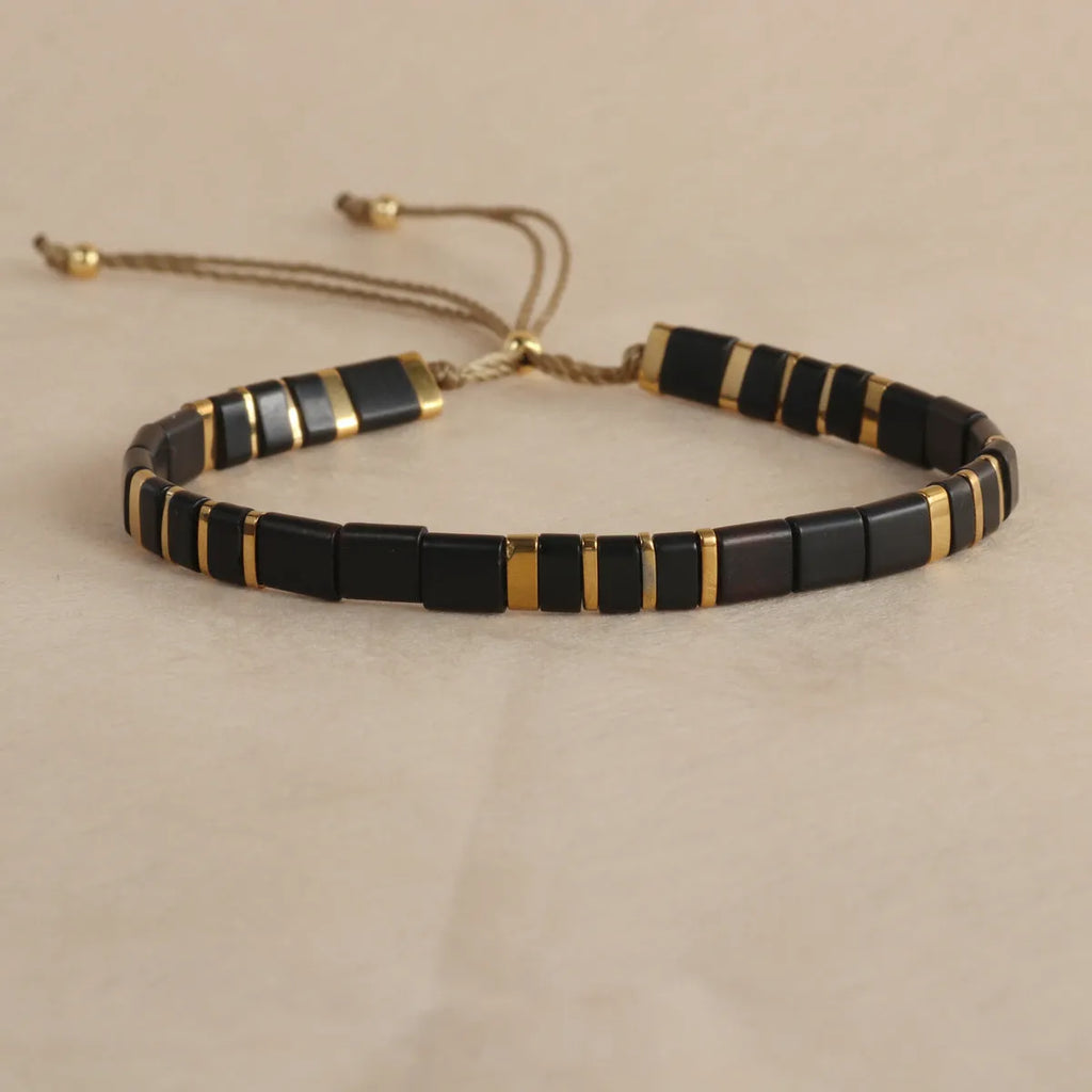Geometric glass and coloured glaze beaded bracelet with round elements in five colour options