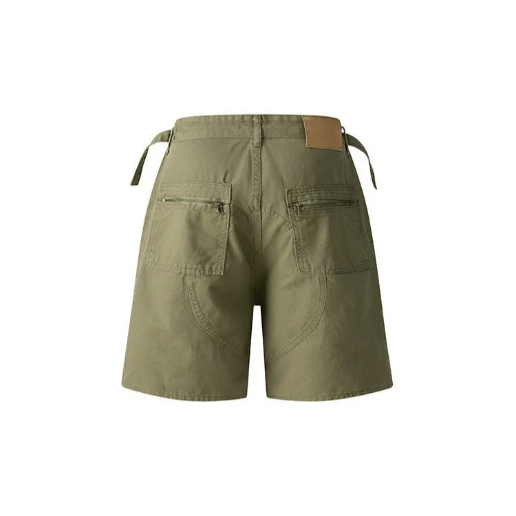 Retro loose fit washed cotton workwear shorts in grey, shown with half elastic waistband and fifth pants length.
