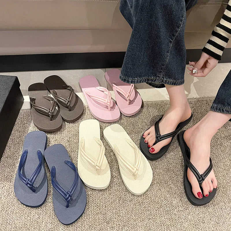 Men's PVC flip flops with toe cover design in multiple colour options showing injection moulded construction