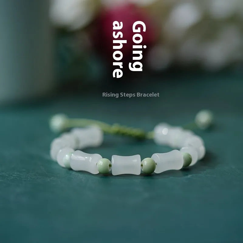 Chinese style bamboo leaf glass bracelet for women with a bamboo joint design.