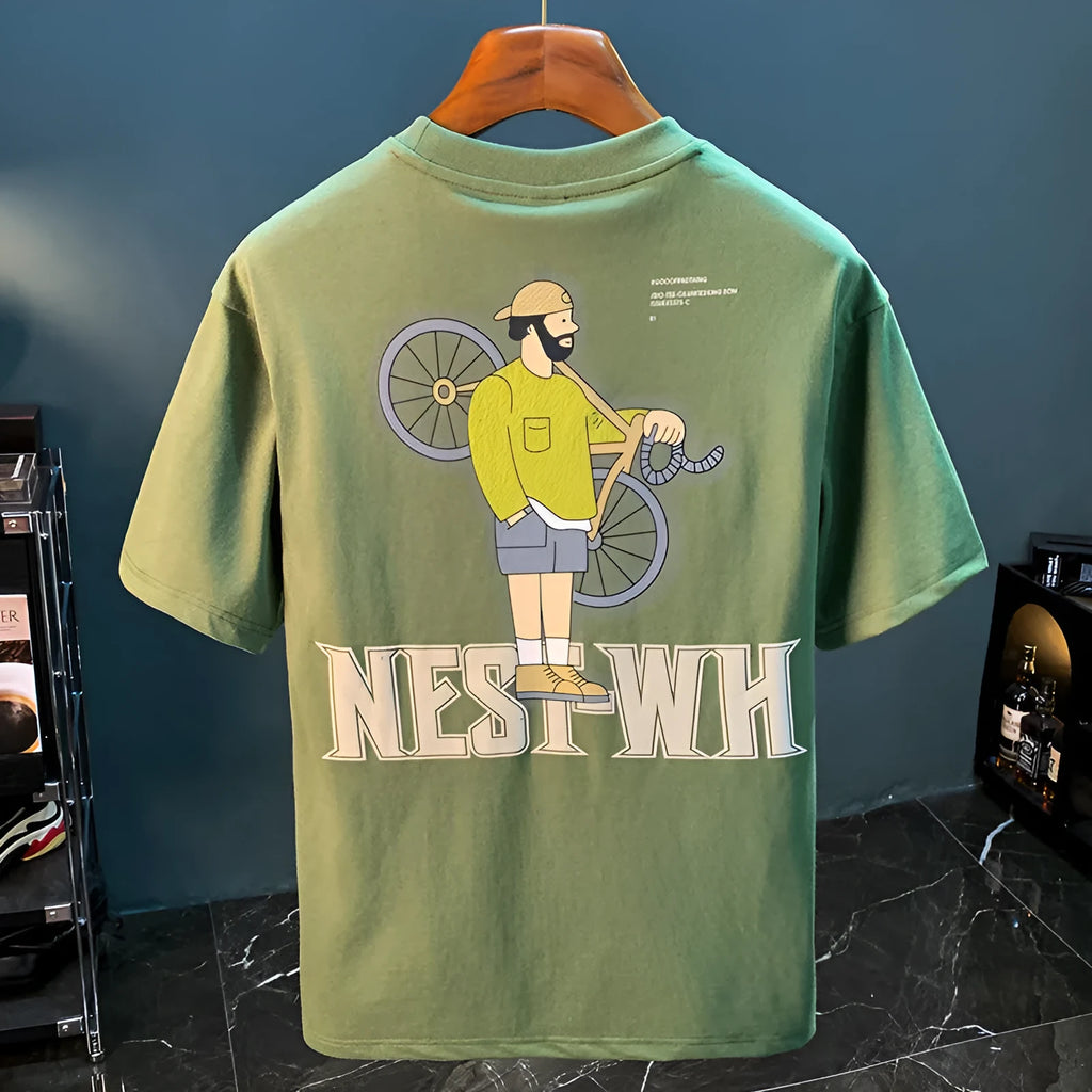Green loose fit men's t-shirt with a front graphic print and short sleeves on a hanger.
