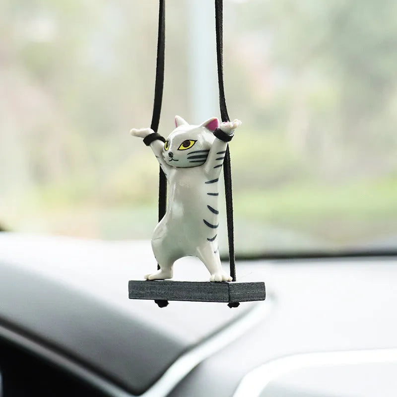Cartoon-style resin cat pendant on a rope for car interior decoration