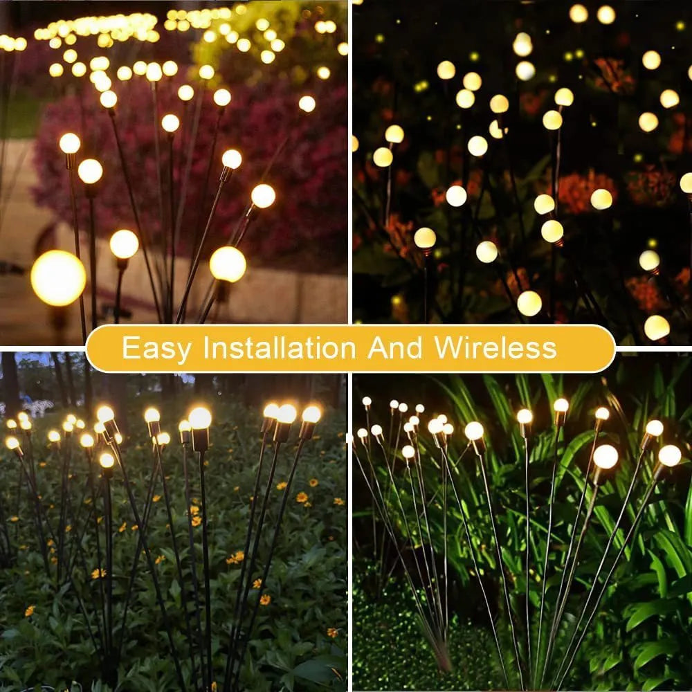 Solar-powered LED garden ground light with multiple heads and a stainless steel stake inserted into soil.