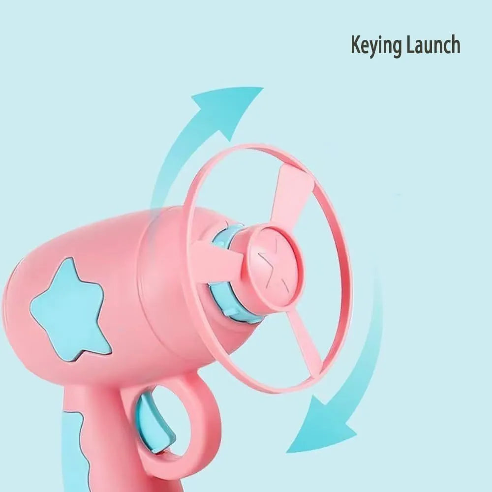Blue or pink plastic cat toy gun launcher with spinning Frisbee for indoor cat play.