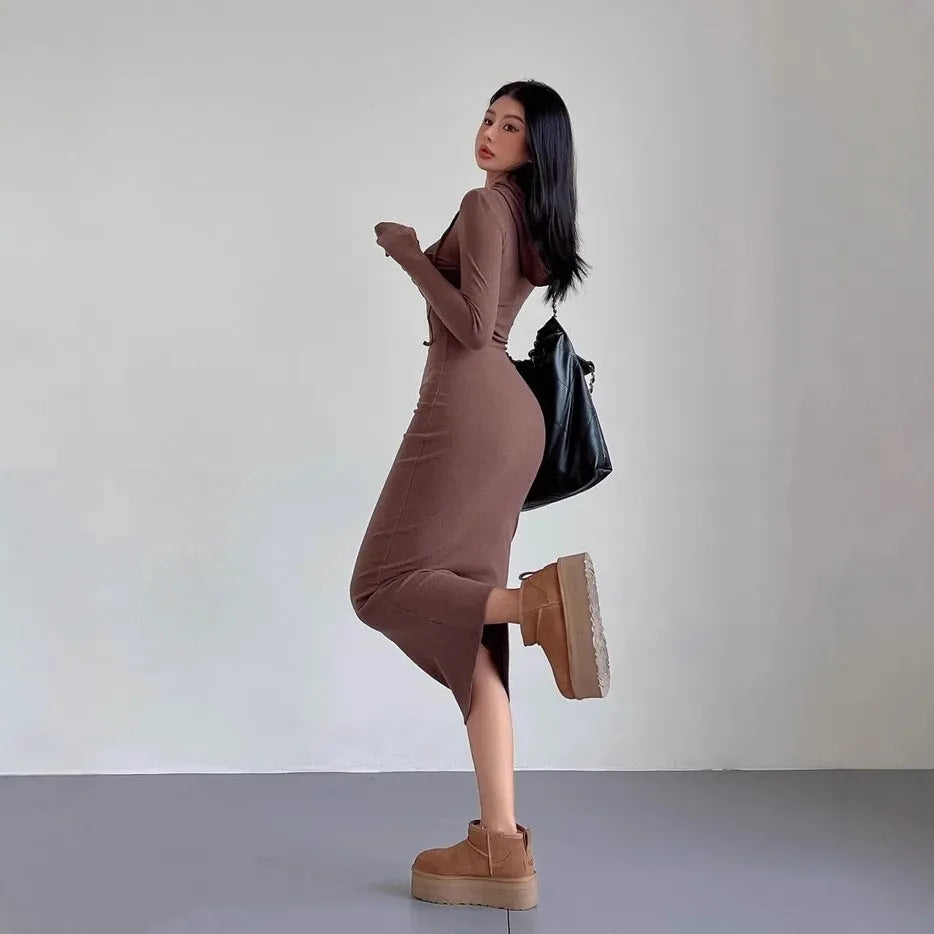 Women's long sleeve hooded sheath dress in light grey, shown over-the-knee length.
