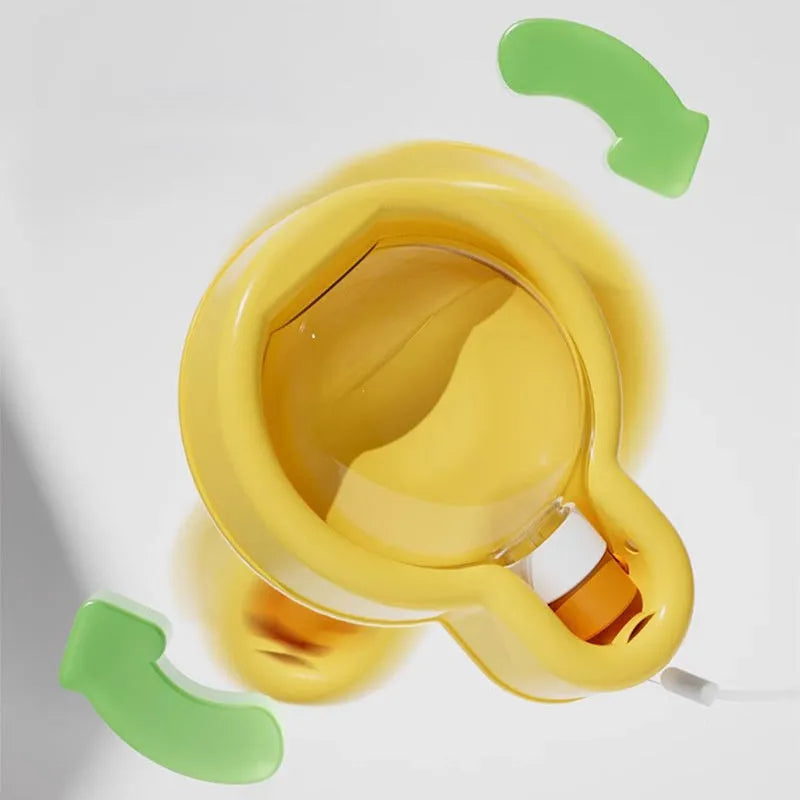 Green portable dog travel cup with pull-out bowl and handle, shown next to a backpack.